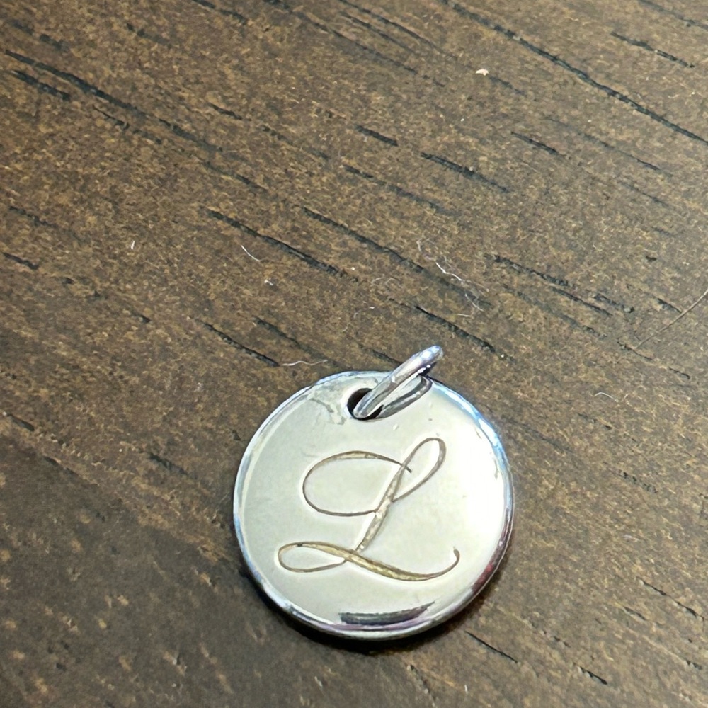 Tiffany and Co small notes disc charm letter L
